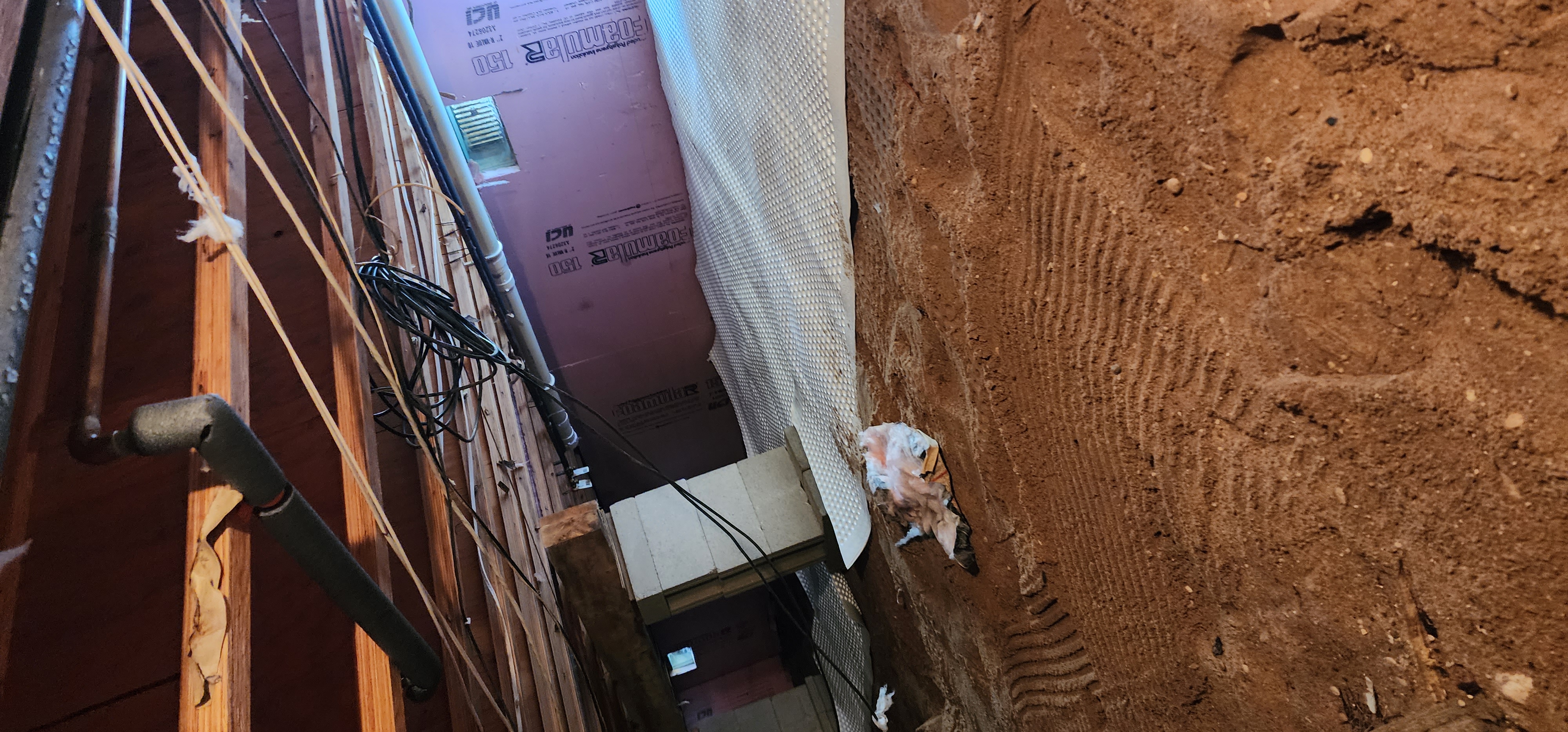 A professionally encapsulated crawlspace in a Boyne City home showing sealed and clean surroundings.