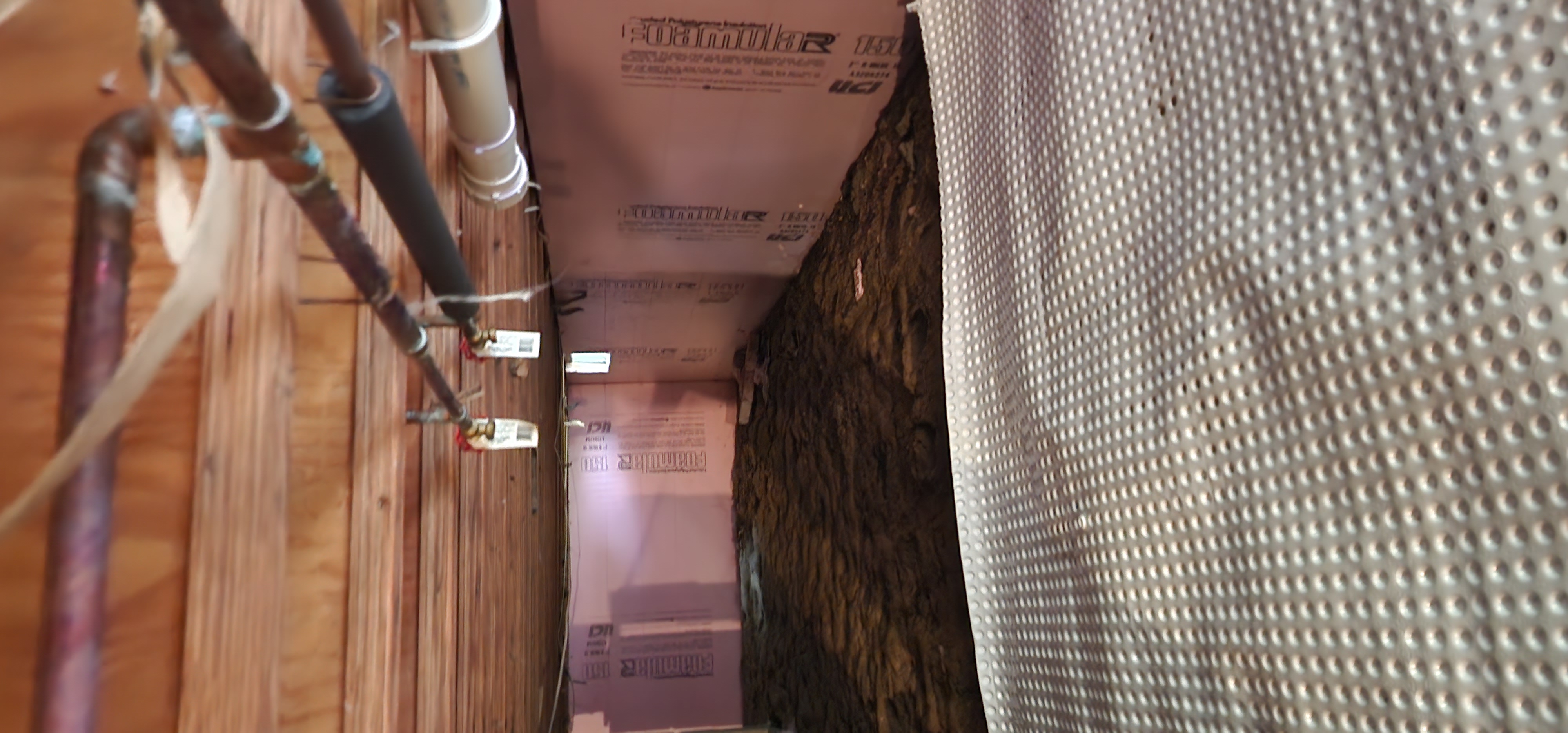 Crawlspace encapsulation setup in a home in Shepherd, Michigan