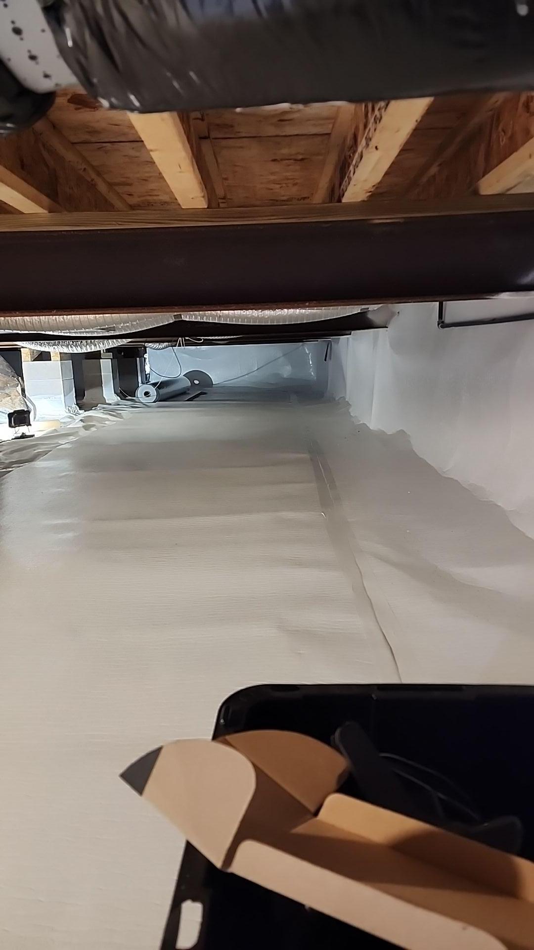Crawlspace encapsulation process in a Grawn, Michigan home.