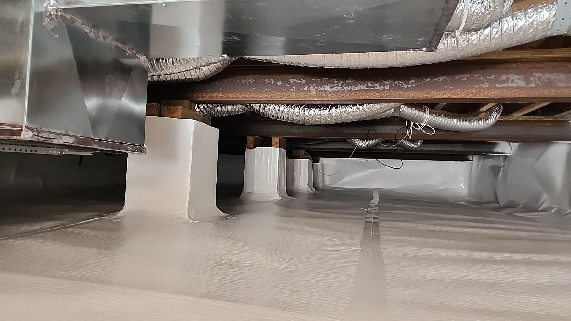 Crawlspace encapsulation process in a Mount Pleasant, Michigan home.