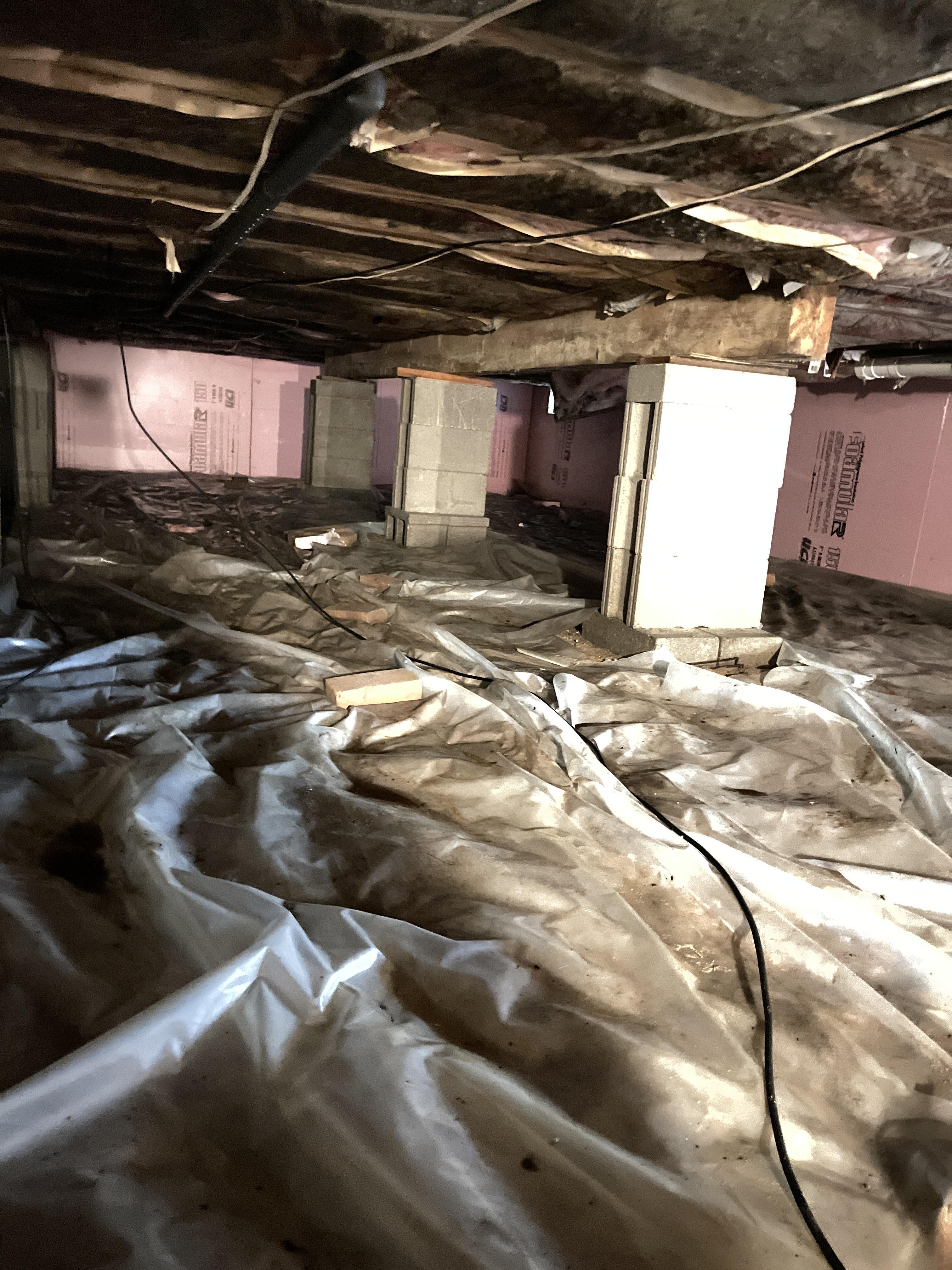 A clean, dry, and well-maintained crawlspace encapsulated to prevent moisture damage.